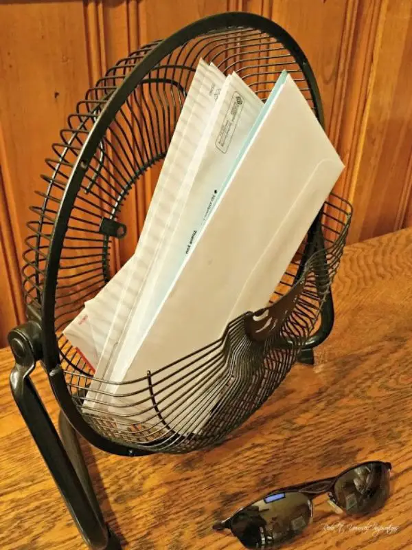 Repurposed fan with Envelopes in it