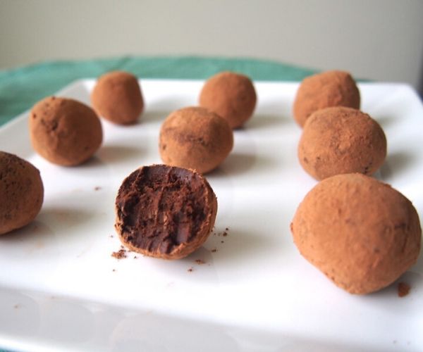 Chocolate Avocado Truffles on a White Plate