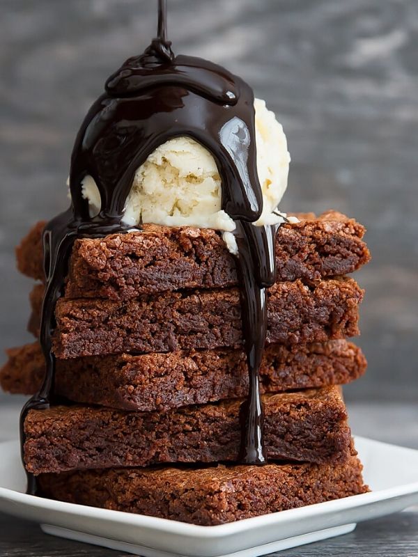 Nutella Brownies with Ice Cream and Chocolate Sauce on top