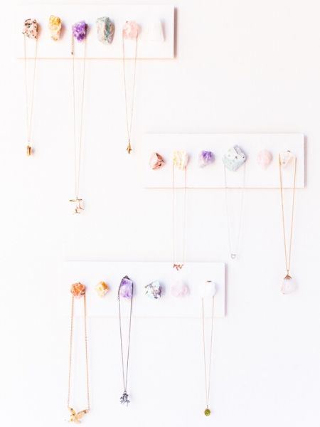 Crystal sticked to the wall as a necklace display