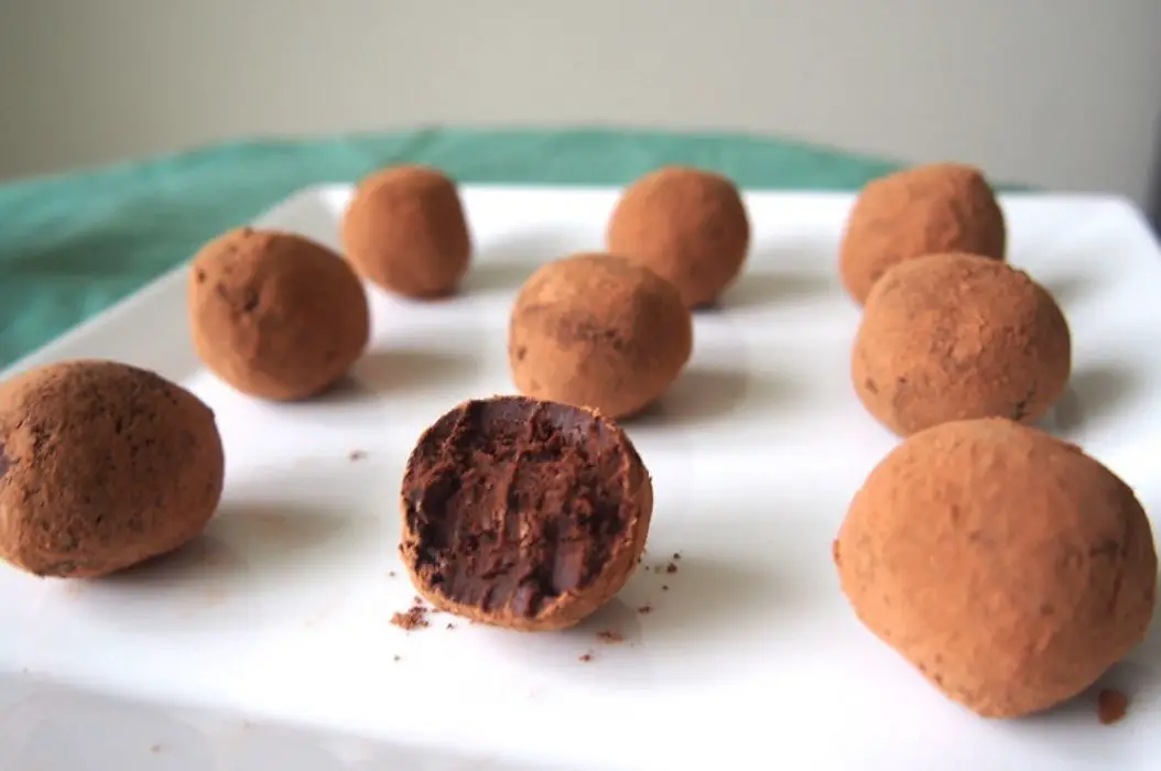 Chocolate Avocado Truffles on A White Plate