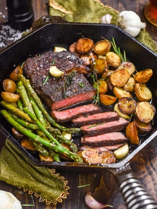 Pan-Fried Garlic Butter Steak with Crispy Potatoes and Asparagus